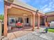 Outdoor living on the patio includes an egg chair and dining area at 5805 E Agave Pl, Carefree, AZ 85377