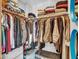 Spacious walk-in closet with abundant storage, shelving, and hanging space at 5805 E Agave Pl, Carefree, AZ 85377