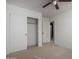 Cozy bedroom featuring a closet with sliding doors for space saving at 6312 W Villa Linda Dr, Glendale, AZ 85310