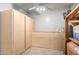 Garage featuring built-in storage and epoxy flooring at 6312 W Villa Linda Dr, Glendale, AZ 85310