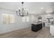 Bright kitchen featuring an island, stainless appliances, and an open layout at 6312 W Villa Linda Dr, Glendale, AZ 85310