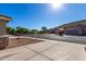 View of the street with sidewalks, desert landscaping, and houses with mountain views in the background at 6312 W Villa Linda Dr, Glendale, AZ 85310