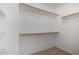 Walk-in closet featuring wall to wall shelving at 6312 W Villa Linda Dr, Glendale, AZ 85310