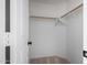 Walk-in closet featuring wall to wall shelving at 6312 W Villa Linda Dr, Glendale, AZ 85310