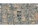Aerial view of a residential area with the property outlined in red, surrounded by streets and houses at 6408 S 10Th St, Phoenix, AZ 85042