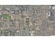 Aerial view of a residential area with the property outlined in red, surrounded by streets and houses at 6408 S 10Th St, Phoenix, AZ 85042