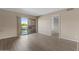 Bedroom with wood flooring, walk-out access to patio, and abundant natural light at 7430 E Chaparral Rd # A239, Scottsdale, AZ 85250