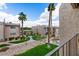 Scenic view of the condo community featuring lush landscaping and a charming courtyard at 7430 E Chaparral Rd # A239, Scottsdale, AZ 85250