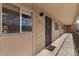 Exterior hallway leading to the unit entrance, showcasing the secure entry door at 7430 E Chaparral Rd # A239, Scottsdale, AZ 85250