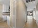 Interior hallway view, leading to a view of the balcony and outdoor seating area at 7430 E Chaparral Rd # A239, Scottsdale, AZ 85250