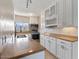 A bright kitchen featuring stainless steel appliances, light countertops, and white cabinetry at 7430 E Chaparral Rd # A239, Scottsdale, AZ 85250