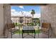 Charming patio area with outside seating and beautiful views of the well-maintained outside space and landscaping at 7430 E Chaparral Rd # A239, Scottsdale, AZ 85250