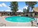 Resort style community pool with ample seating areas and shade at 7430 E Chaparral Rd # A239, Scottsdale, AZ 85250