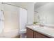 Cozy bathroom features a shower-tub, white fixtures, and tile flooring at 7500 E Deer Valley Rd # 68, Scottsdale, AZ 85255