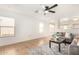 Bright living room featuring a ceiling fan, neutral paint, and tile flooring at 7500 E Deer Valley Rd # 68, Scottsdale, AZ 85255