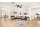 Bright living room featuring a ceiling fan, neutral paint, and tile flooring at 7500 E Deer Valley Rd # 68, Scottsdale, AZ 85255