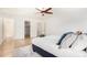 Bright main bedroom featuring ensuite bath, ceiling fan, and neutral paint at 7500 E Deer Valley Rd # 68, Scottsdale, AZ 85255