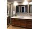 Bathroom featuring a mirror, vanity, and bright lighting at 839 S Westwood -- # 187, Mesa, AZ 85210
