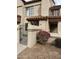 Charming home featuring a gated front yard, a stucco facade, and a red tile roof at 839 S Westwood -- # 187, Mesa, AZ 85210