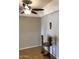 Inviting space with tile floors, a ceiling fan, and decorative art, creating a cozy and stylish ambiance at 839 S Westwood -- # 187, Mesa, AZ 85210