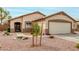 Exterior shot of the home showcasing well-maintained landscaping and a welcoming facade at 8541 W Echo Ln, Peoria, AZ 85345
