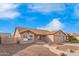 Charming single-story home with a well maintained exterior, a two car garage, and gravel landscaping at 8947 W Sierra Vista Dr, Glendale, AZ 85305