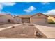 Charming single-story home with a neutral color palette, well-maintained landscaping, and a two car garage at 8947 W Sierra Vista Dr, Glendale, AZ 85305