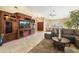 Entertainment-ready living room featuring custom built-ins and comfortable furnishings at 8960 W Kerry Ln, Peoria, AZ 85382