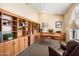 Home office featuring custom wood built-ins and functional layout at 8960 W Kerry Ln, Peoria, AZ 85382