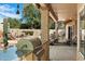 This outdoor kitchen area has a built-in stainless steel grill and granite countertop, perfect for outdoor entertaining at 8960 W Kerry Ln, Peoria, AZ 85382