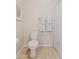 Bright and clean bathroom features a standard toilet and shower with curtain at 9910 E Theia Dr, Mesa, AZ 85212