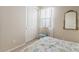 Cozy bedroom with closet, natural light, and neutral tones at 9910 E Theia Dr, Mesa, AZ 85212