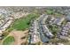 Scenic aerial view of a golf course community featuring lush green fairways and well-maintained homes at 1240 E Friess Dr, Phoenix, AZ 85022