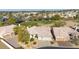 Birds eye view of home, showcasing desert landscaping, tile roof, and proximity to a golf course at 1240 E Friess Dr, Phoenix, AZ 85022