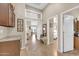 Hallway with tile flooring and multiple doorways leading to other rooms at 1240 E Friess Dr, Phoenix, AZ 85022