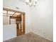 Dining area with a view of the kitchen, featuring ample cabinet space and modern appliances at 1331 W Baseline Rd # 340, Mesa, AZ 85202