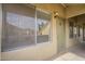 Exterior view of the condo front door with a window that provides natural light at 1331 W Baseline Rd # 340, Mesa, AZ 85202