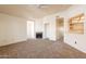 Inviting living room features a fireplace and an open layout to the kitchen at 1331 W Baseline Rd # 340, Mesa, AZ 85202