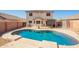 Inviting backyard pool with a patio, perfect for relaxation and entertaining in a private outdoor space at 13321 N 124Th Ave, El Mirage, AZ 85335