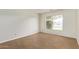 This airy bedroom boasts natural light, fresh paint, and updated hardwood floors at 14426 N 52Nd Ave, Glendale, AZ 85306