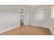 This bedroom features hardwood floors, a closet, and great natural light at 14426 N 52Nd Ave, Glendale, AZ 85306