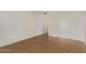 This bedroom offers hardwood floors, two closets, and fresh paint at 14426 N 52Nd Ave, Glendale, AZ 85306