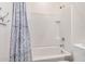 Small bathroom featuring a white tiled tub and shower at 1446 E Canary Dr, Gilbert, AZ 85297