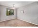 Bright dining area featuring neutral paint, tile floors, modern light fixture, and a window at 1446 E Canary Dr, Gilbert, AZ 85297