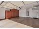 Garage with overhead door and a wall of storage cabinets at 1446 E Canary Dr, Gilbert, AZ 85297