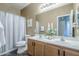 Bathroom featuring double sinks, spacious vanity, and updated fixtures at 14837 W Crocus Dr, Surprise, AZ 85379