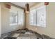 Dining area featuring tile flooring, bright windows, and neutral wall color at 14837 W Crocus Dr, Surprise, AZ 85379