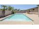 Sparkling pool in a private backyard setting, perfect for relaxation and entertaining at 14837 W Crocus Dr, Surprise, AZ 85379
