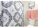 Bathroom featuring a toilet, patterned shower curtain, and wall decor at 1525 W Bent Tree Dr, Phoenix, AZ 85085