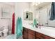 This bathroom features a single sink vanity, a mirror, and a shower-tub combo at 1525 W Bent Tree Dr, Phoenix, AZ 85085